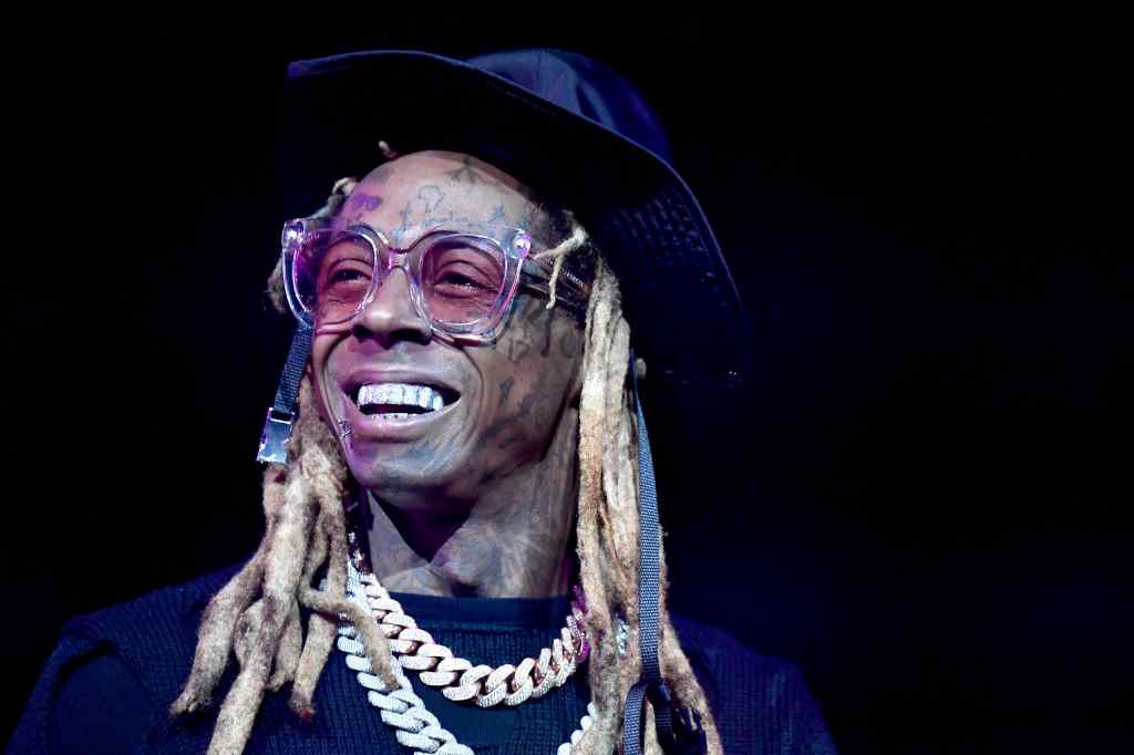 Lil Wayne hints that he may have recently got married after he tweeted that he was the 