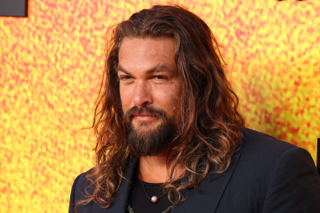 Actor Jason Momoa shaves his hair in new video as he asks his supporters to limit the use of single-use plastics.