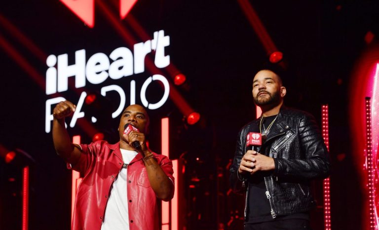 LAS VEGAS, NEVADA - SEPTEMBER 22: (FOR EDITORIAL USE ONLY) (L-R) Charlamagne tha God and DJ Envy speak onstage during the 2023 iHeartRadio Music Festival at T-Mobile Arena on September 22, 2023 in Las Vegas, Nevada.
